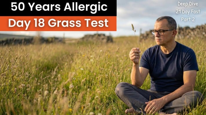 Man sitting in timothy grass field after 18 days of fasting, testing allergy reversal