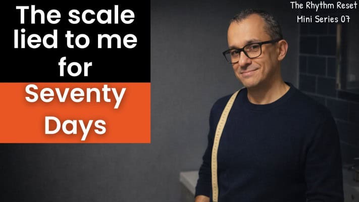 Man comparing body measurements after 70-day fasting reset showing 3.5 inches lost