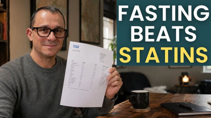 Neil reviewing NHS blood test results showing cholesterol improvements off statins